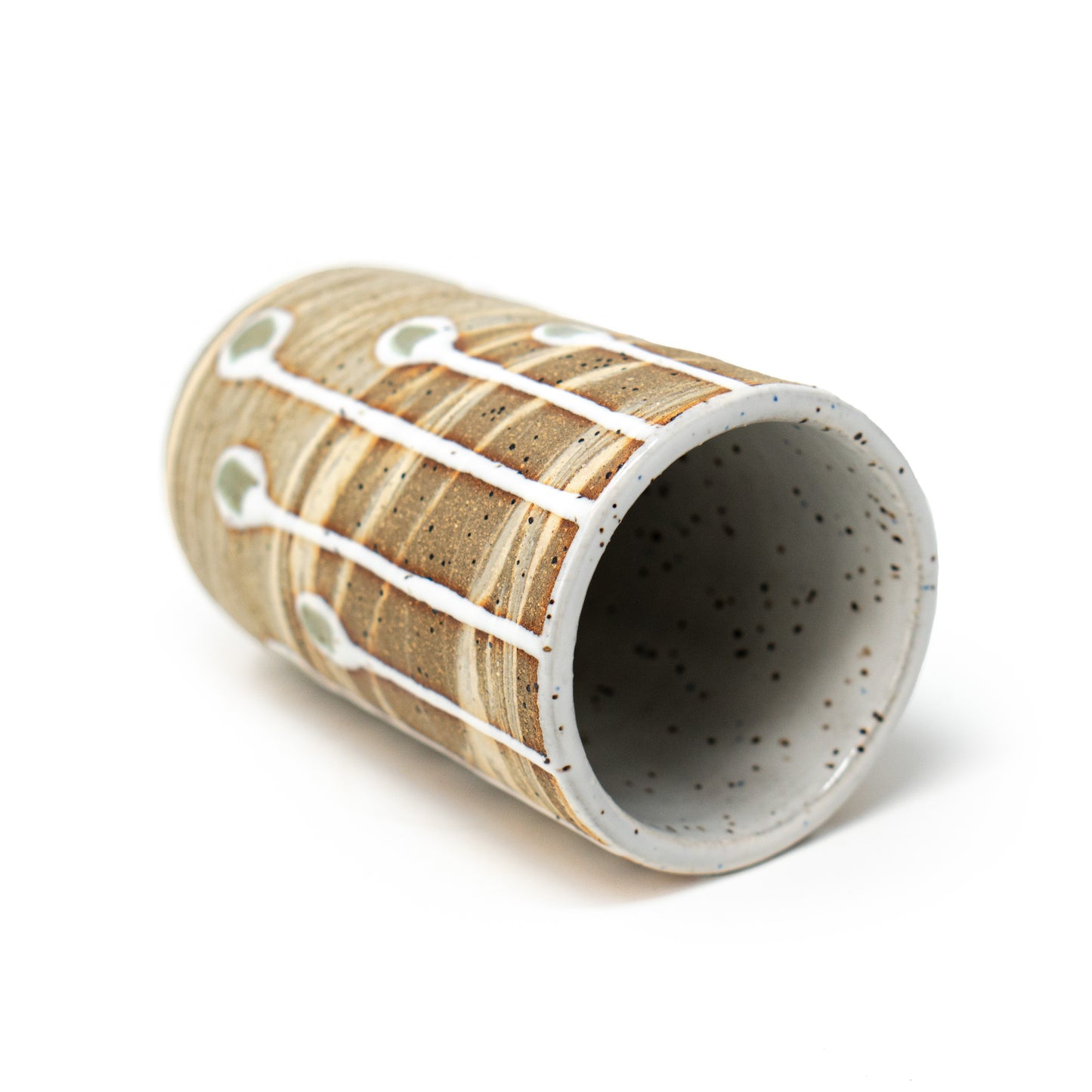 ceramic tumbler on side