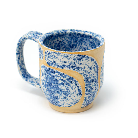cream and blue speckled ceramic mug by a hill studio